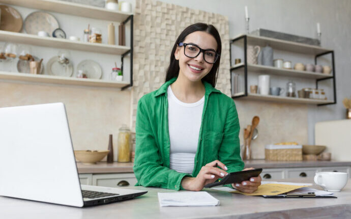 lady with specs looking straight at camera