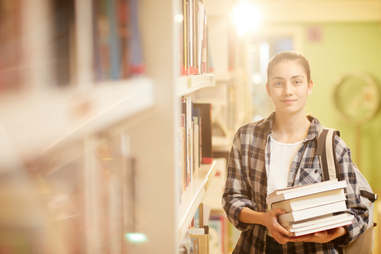 student carrying books