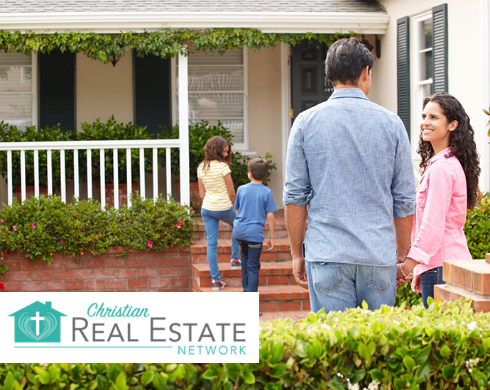 Family in front of House - Christian Real Estate Network Logo