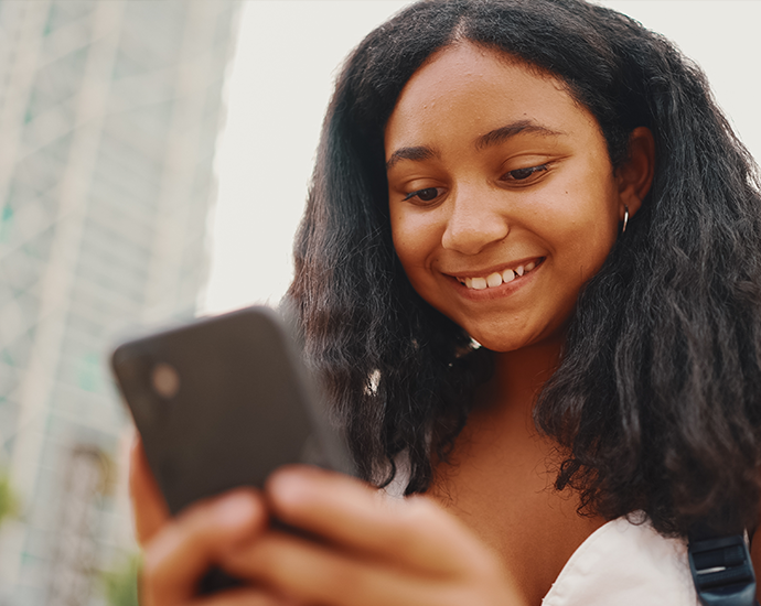 Young Teen Girl on Mobile Phone
