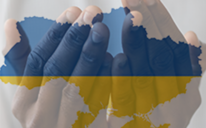 Hands with Ukraine map overlay.