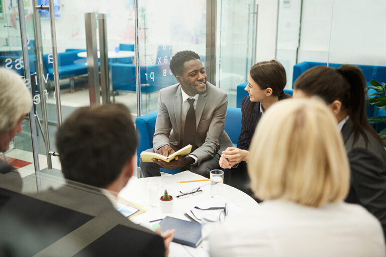 multi ethnic business meeting