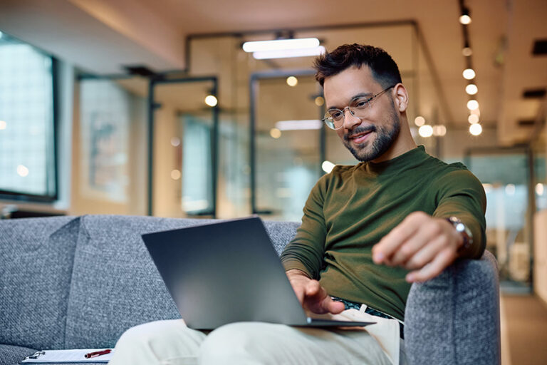 Entrepreneur looking at laptop