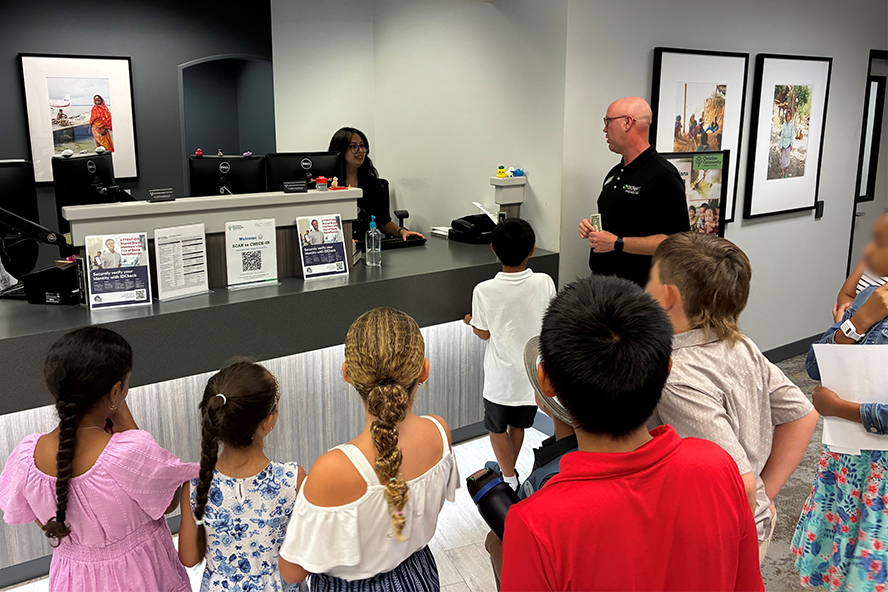 Kids Making Deposit at the Branch